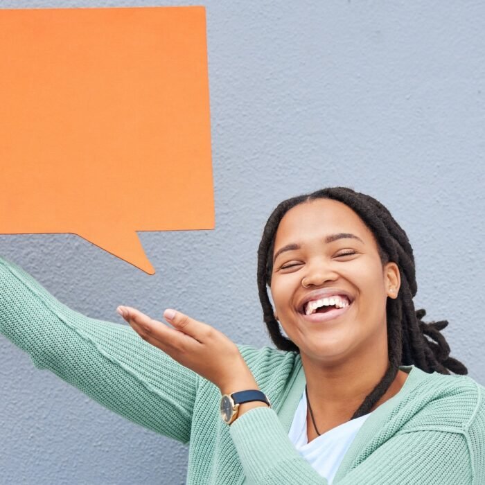 Black woman, portrait or showing speech bubble on isolated background of opinion mockup, social med